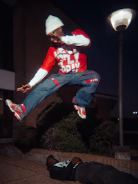 a man is doing a trick on a skateboard